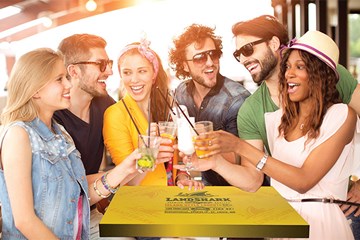 Group of young adults enjoying drinks at Landshark Bar and Grill at Resorts Casino Hotel
